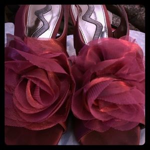 Nina with heels flower on top.